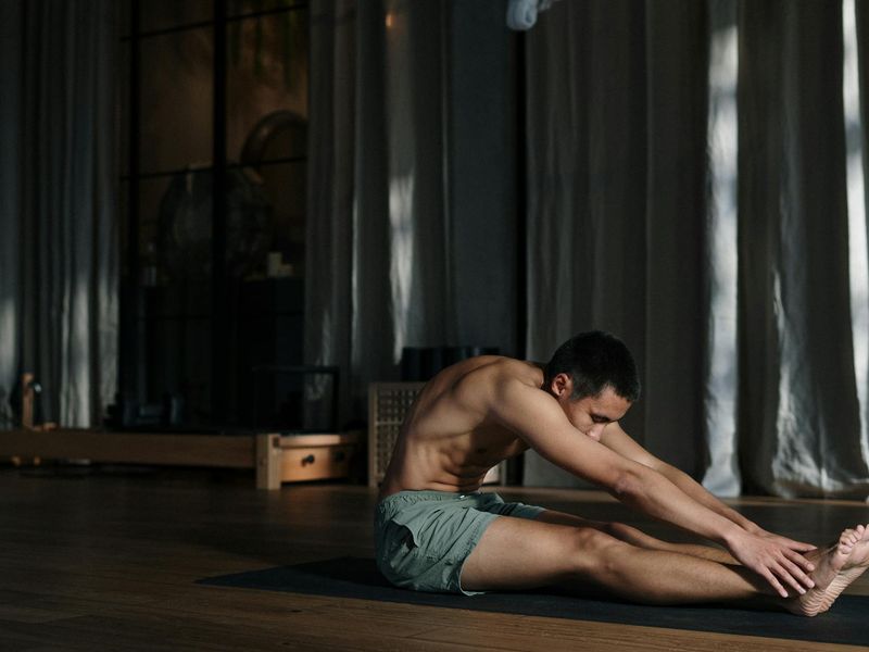Atmospheric training room with neon lights and yoga mats